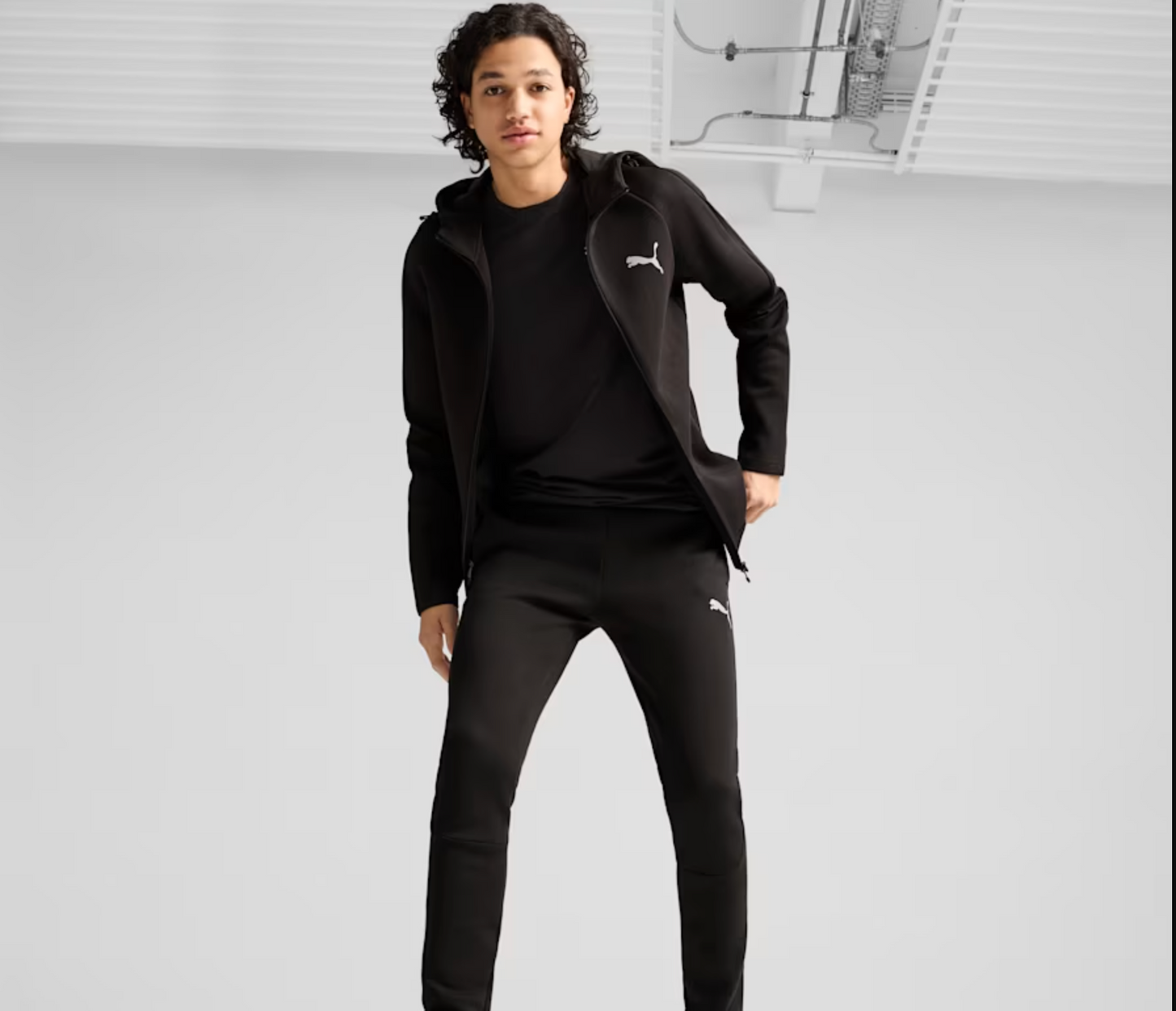 TUTA PUMA DONNA TECK EVOSTRIPE