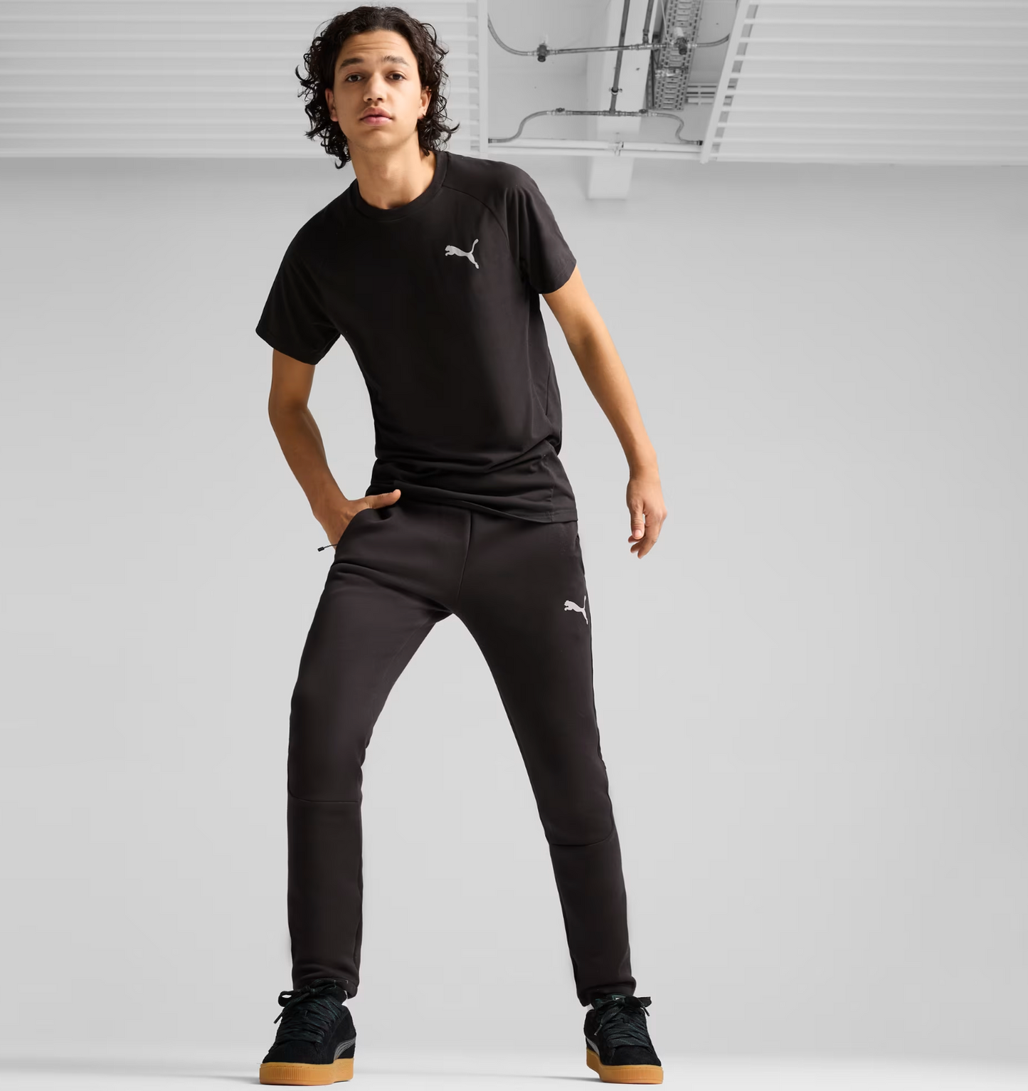 TUTA PUMA DONNA TECK EVOSTRIPE