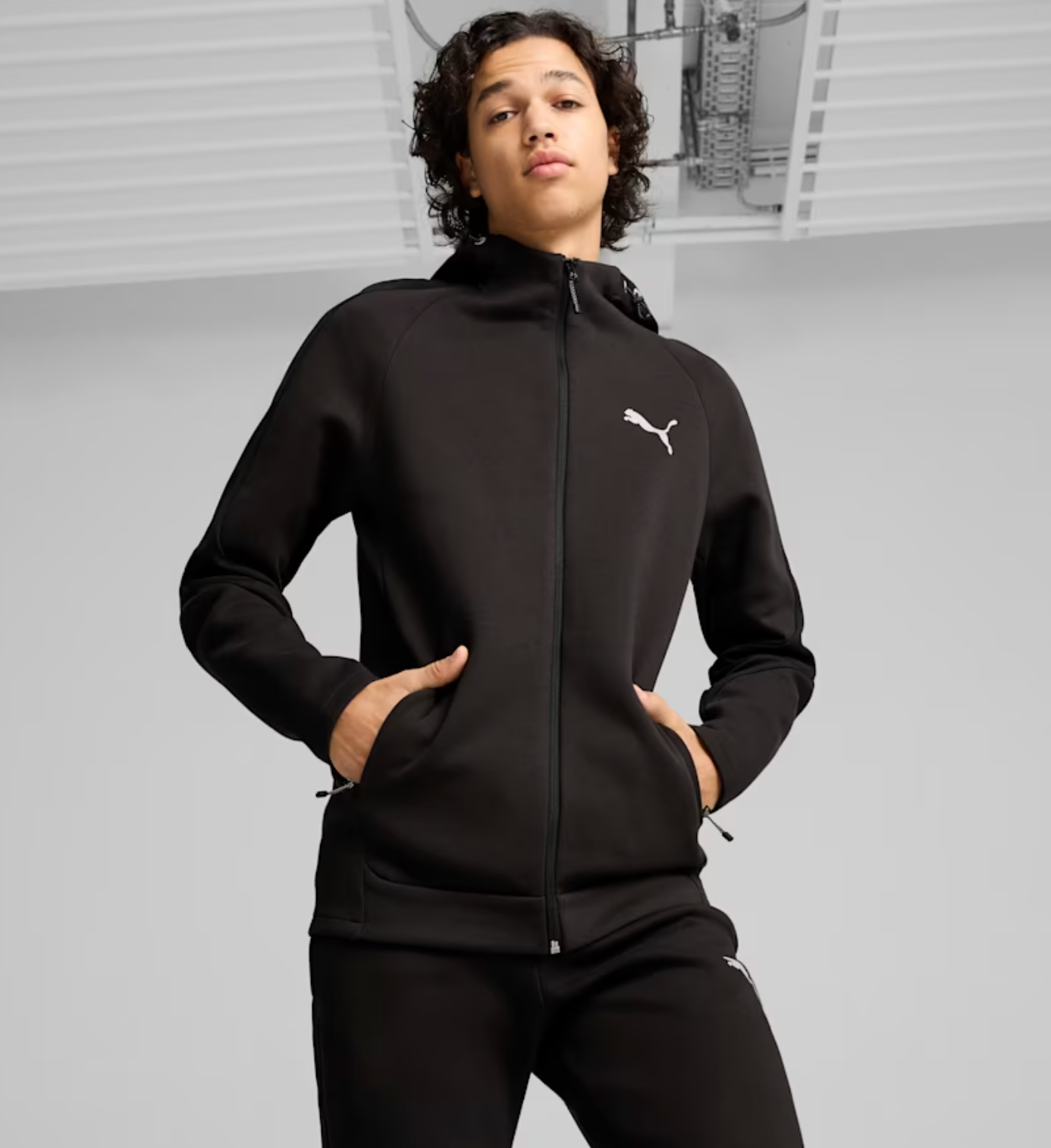 TUTA PUMA DONNA TECK  EVOSTRIPE